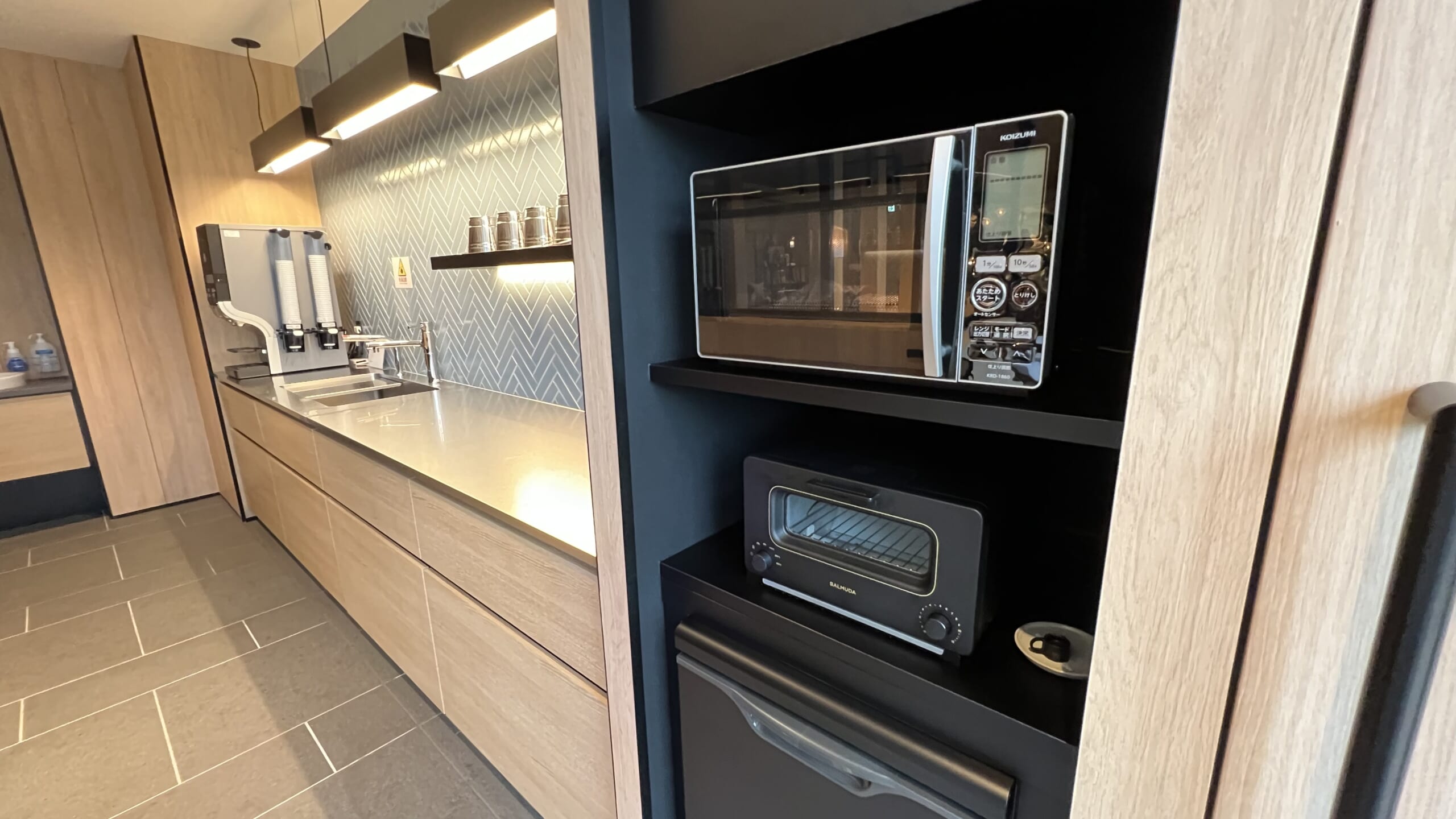 a microwave oven on a shelf