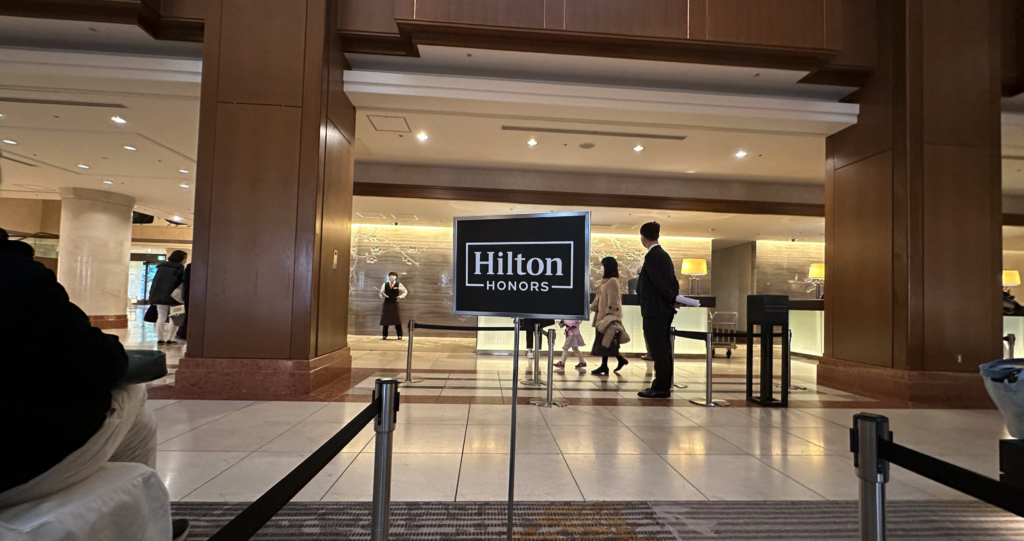 a group of people in a hotel lobby